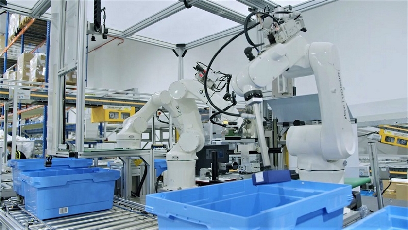 Robotic labelling system inside Red Lion
